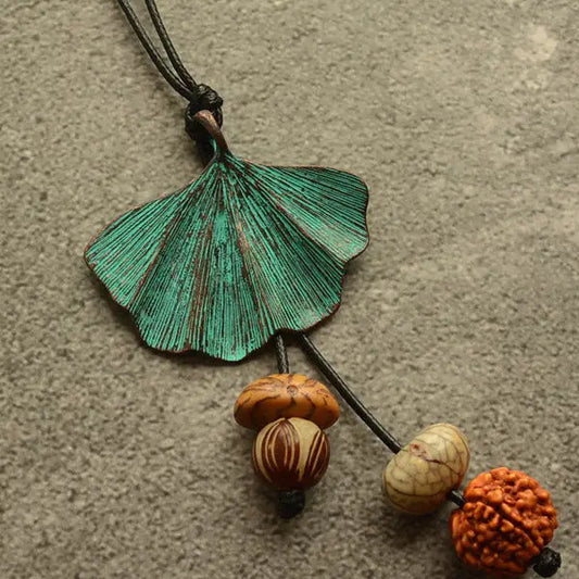faire necklace wooded beads - Necessities Boutique